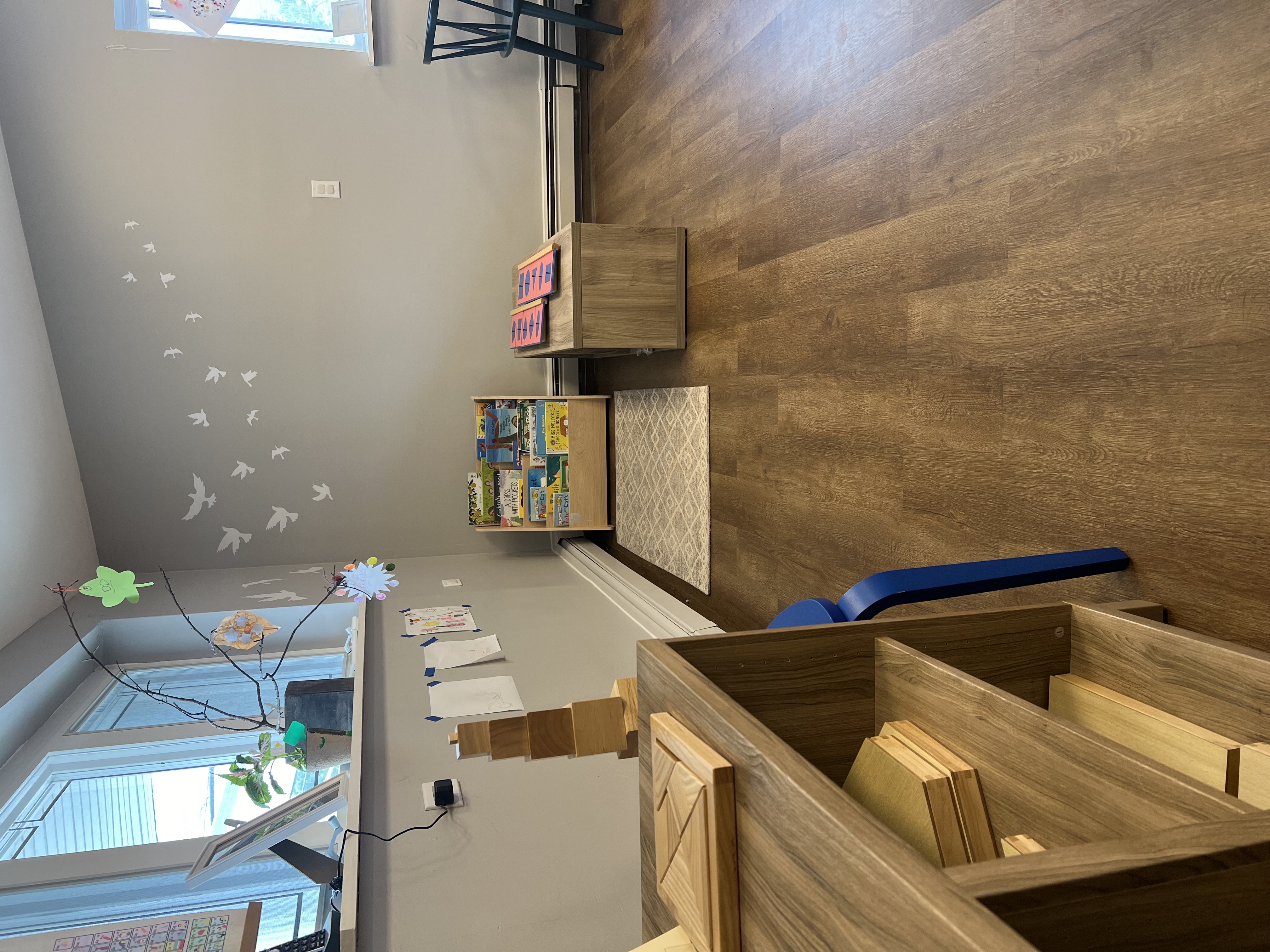 A learning room at Elements Workspace with natural light and prepared materials.