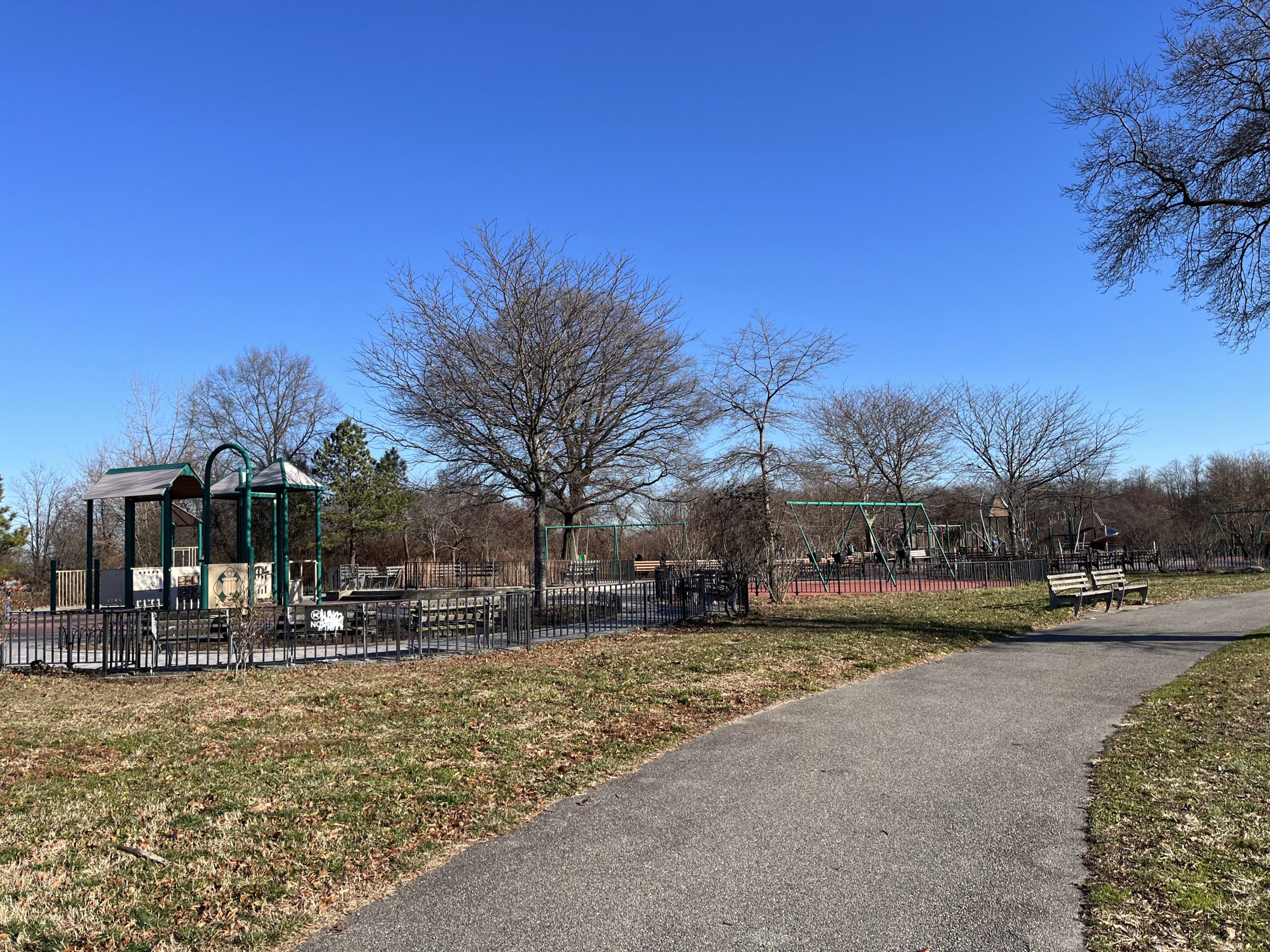 Playground and walking path across the street from Elements Workspace.